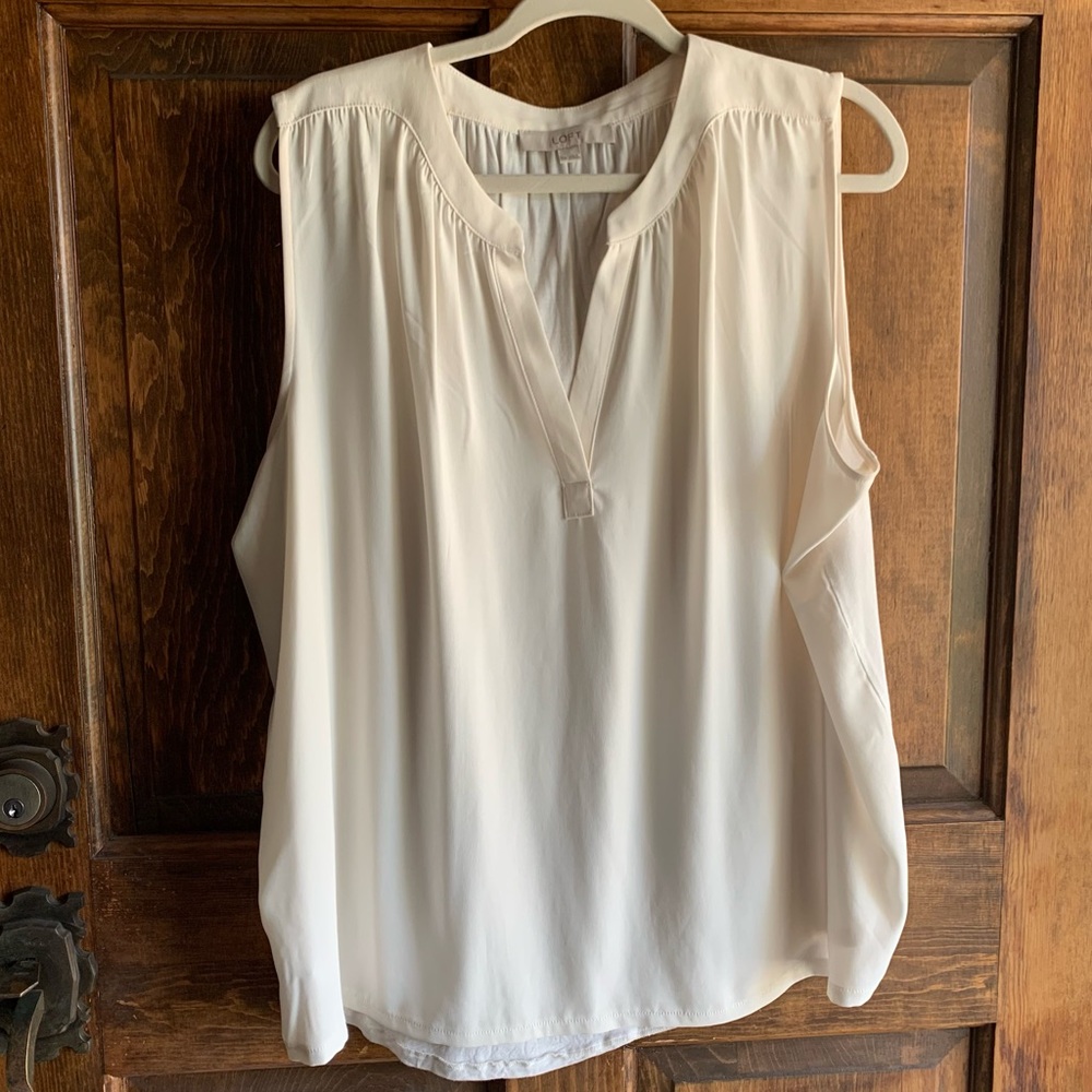 Beautiful, like new, sleeveless Mixed Media Loft blouse in cream